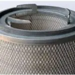 Twist-lock cartridge filter with the mounting hardware visible at the top end cap